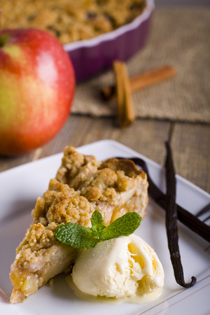 Apple pie with crumble. A piece of cake.の写真素材