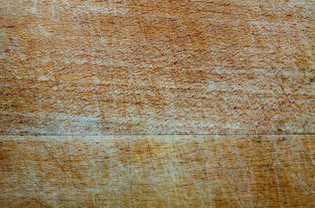wood board weathered with scratch texture vintage backgroundの写真素材