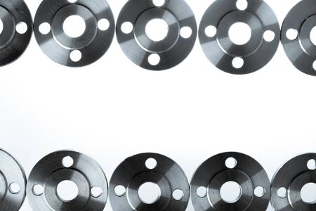 Border of flat steel welding flanges on white background.の写真素材