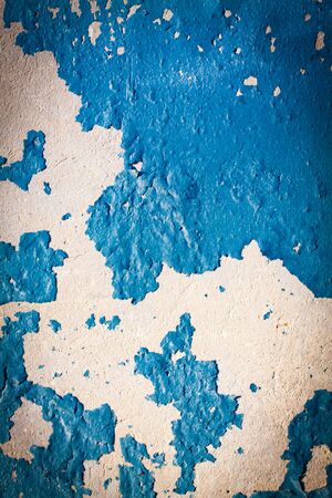 Peeling paint on wall seamless texture. Pattern of rustic blue grunge material.の写真素材