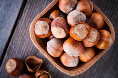 Hazelnuts on a wooden background.の写真素材