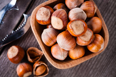 Hazelnuts on a wooden background.の写真素材