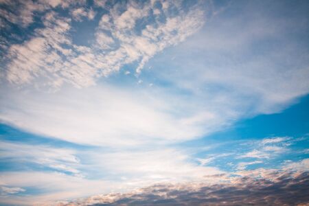 Sky with different types of clouds during sunrise. Background.の写真素材