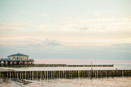 Restaurant on the water and wooden poles. Poland, Baltic, Ustronie Morskie.の写真素材