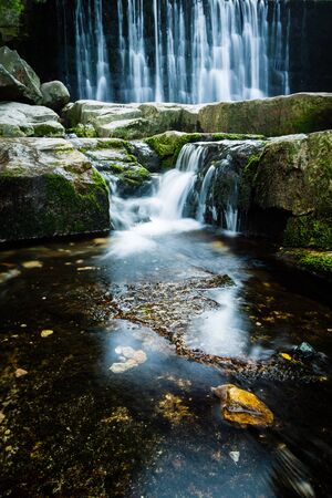 Wild Waterfall in beautiful scenery of Karkonosze Mountains in Karpacz, Polandの写真素材