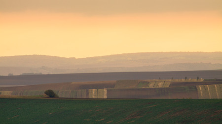 Incredible patterns on waved fields of South Moravia called the Moravian Tuscany, green and brown autumn colors. Czechia.の写真素材