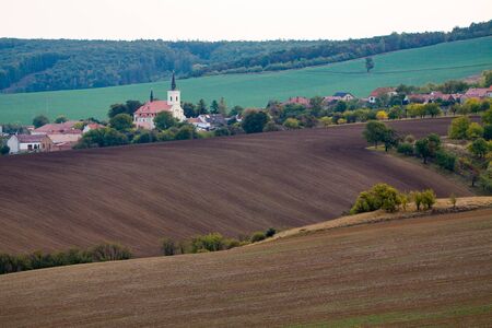 Small village with church at South Moravia in Czechia.の写真素材