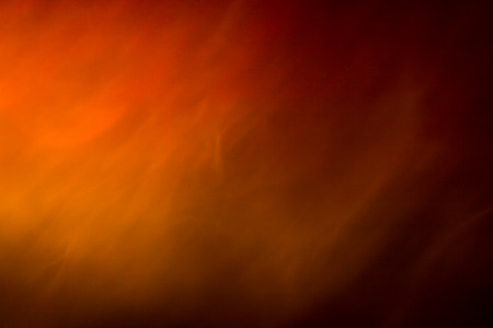 Abstract smoke background color on yellow, orange and red colours.の写真素材