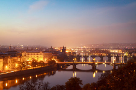 Morning view from above on Prague bridges, Charles Bridge on first plan.