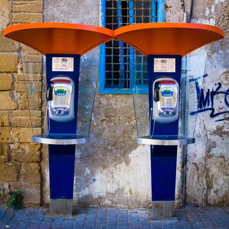 Two symmetrically arranged telephone booths in Morocco.のeditorial素材