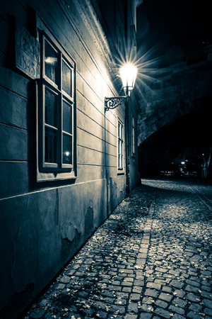 Vintage postcard from Prague, picturesque corner at night.の写真素材