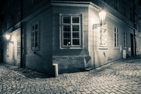 Vintage postcard from Prague, picturesque corner at night.の写真素材