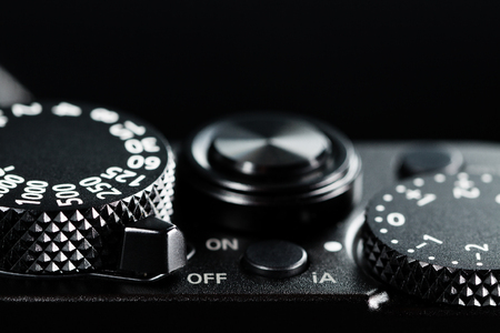 Photo camera knobs and buttons and switches, close up.の写真素材