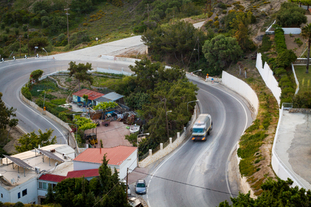Road curve in the route near Kefalos village, with morning work garbage truck.
National highway of Greece Island Kos.の写真素材