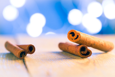 Cinnamon sticks on wooden table, at Christmas atmosphere.の写真素材
