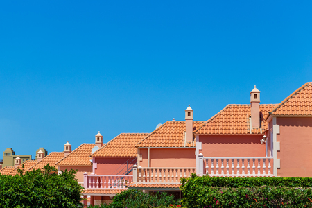 Tile on roofs houses built in row.の写真素材