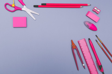 Back to school concept background with pink school accessories.の写真素材