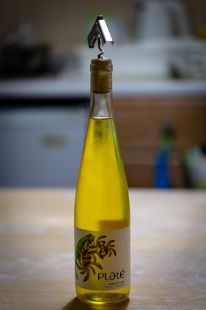 Costa Adeje, Tenerife, Spain - May 25,2018: The bottle of white wine from bananas called Plate.のeditorial素材