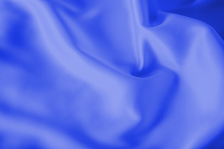 Smooth elegant blue silk or satin luxury cloth texture can use as abstract holidays background. Luxurious Christmas background or New Year background design.の写真素材
