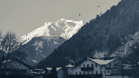 Small hut in Alps mountains in winter scenery.のeditorial素材