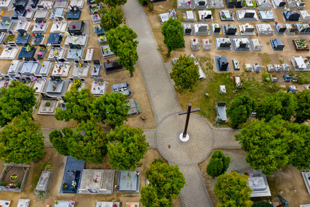 Cemetery tombs and cross, view from above.のeditorial素材