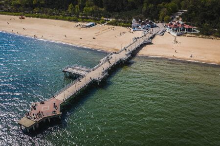 Aerial view on Gdansk Brzezno pier with many people.の写真素材