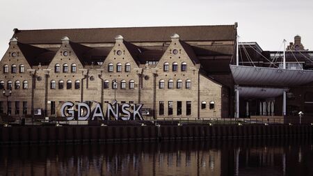 Inscript Gdansk sculpture, old town and Olowianka island in Gdansk.のeditorial素材