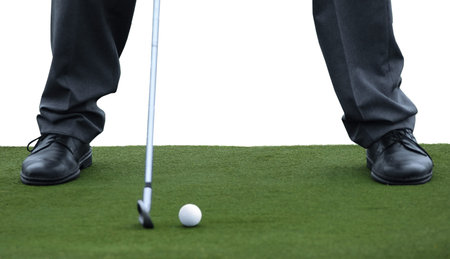 golf stance on green carpet