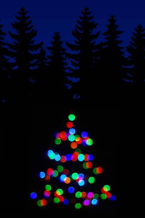 blurred colored lights like a Christmas treeの写真素材