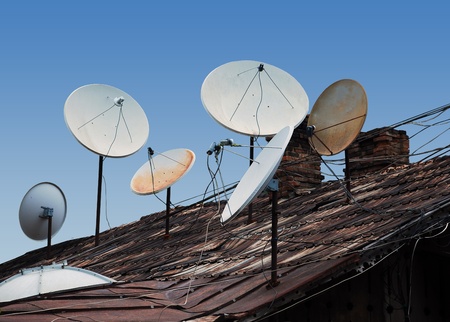 Full roof antennas, and satellite television signal is everywhereの写真素材