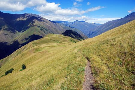 wild Caucasian mountains, abandoned meadows, freedom and libertyの写真素材