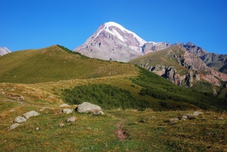 wild Caucasian mountains, abandoned meadows, freedom and libertyの写真素材