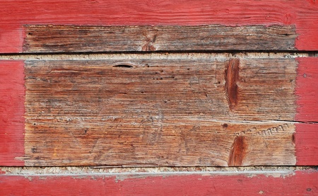 old wooden frame in red color, the structure of aged woodの写真素材