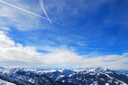 Freedom and beauty of winter high mountains with peaks above the clouds