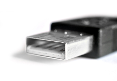 USB connector type A closeup on a white backgroundの写真素材