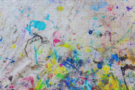 Painting canvas, remnants of paint, splashes of brushes randomly paintedの写真素材