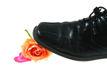 Black shoes, brocken heart and flowerの写真素材