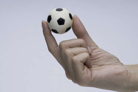 Soccer ball in fingerの写真素材