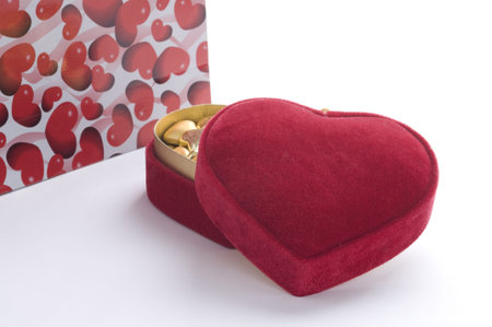 Read heart shaped box with package