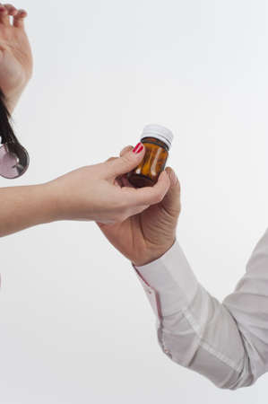 Nurse give pills to patientの写真素材
