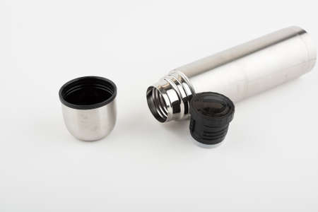 Metal thermos and cup isolated on white backgroundの写真素材