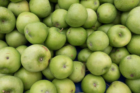 Green Apples on Market Stall Ready For Saleの写真素材