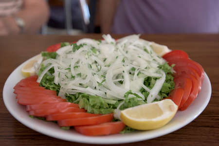 Green Salad Tomato and Onion for Turkish Pizzaの写真素材