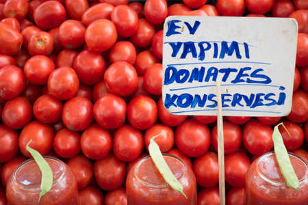 Homemade Tomato Pastes and Organic Tomatoes For Sale in Market Stallの写真素材