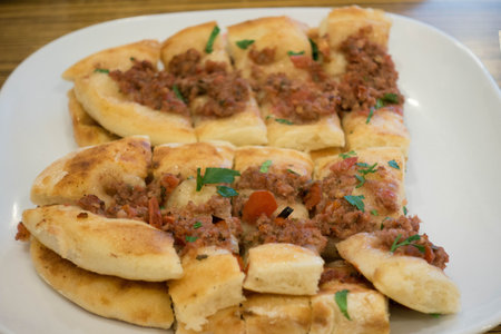 Traditional Turkish Pizza on Served Plate  in a Restaurant