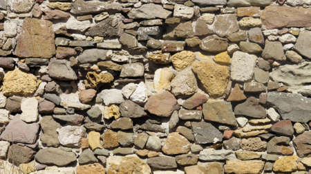 Old Colorfull Stone Wall  on Sunny Day