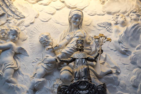 Mother Statue on Churchs Wall in Vilniusの写真素材