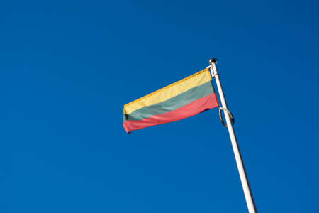 Lithuanian Flag on Pol with Blue Sky 03 July 2015の写真素材