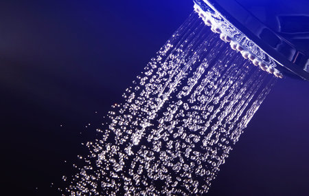 shower water drops on black and blue background