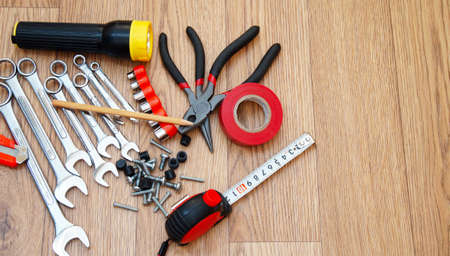 household tools on a wooden backgroundの写真素材
